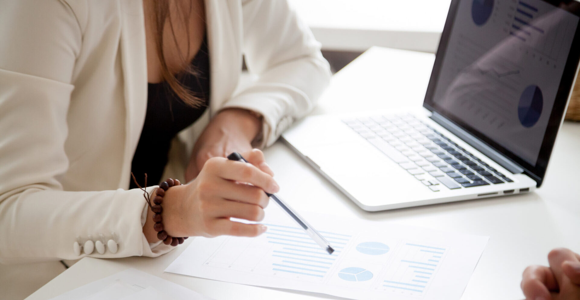 analyzing new marketing plan and sales statistics concept, close